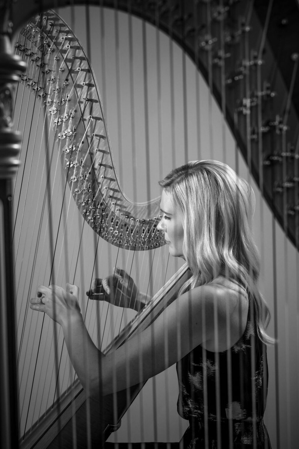 Harpist playing during a musician headshot session at Ann & Kam Photography in Barrington, IL
