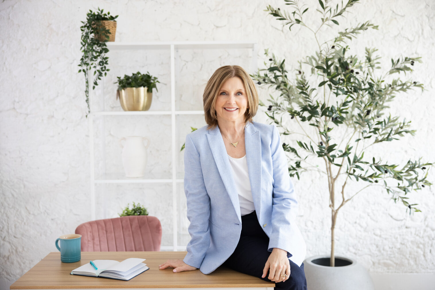 Professional headshot of a midlife woman in Chicago by Ann & Kam Photography, natural and authentic branding portrait.