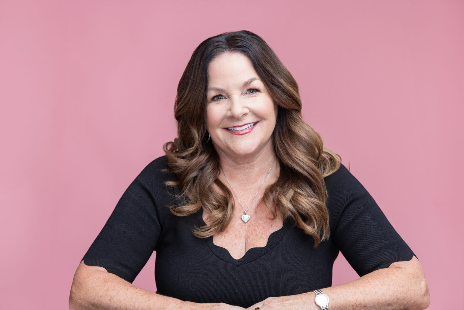 Professional branding headshot of a Chicago-area realtor photographed in a clean, modern style by Ann & Kam Photography.